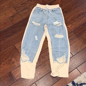 Stylish Ripped Denim Joggers with Beige Panels